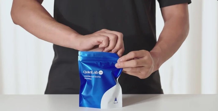Opening the resealable QuietLab Pro pouch